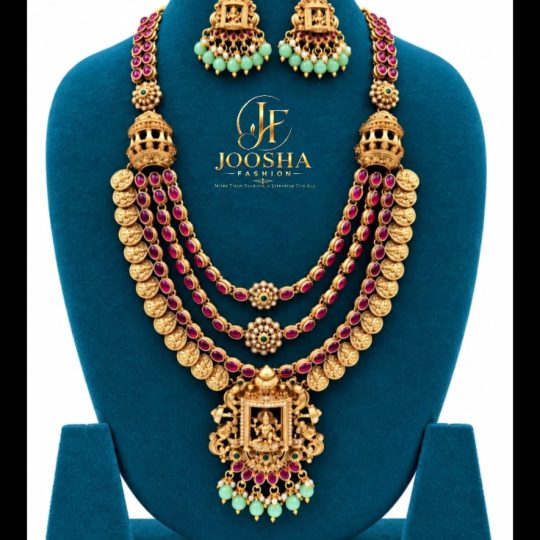 Premium Multilayered Lakshmi Temple Jewellery Necklace Set With Matching Jhumkas, Ruby-Red stones, and Green Beads